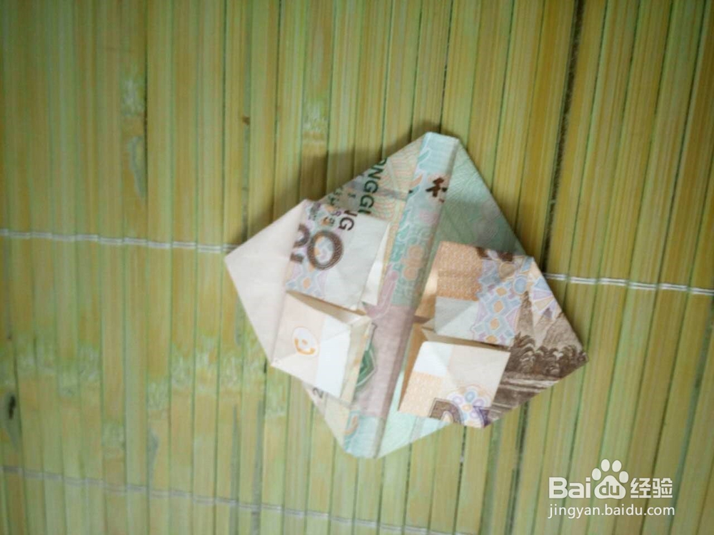 如何用纸币折爱心