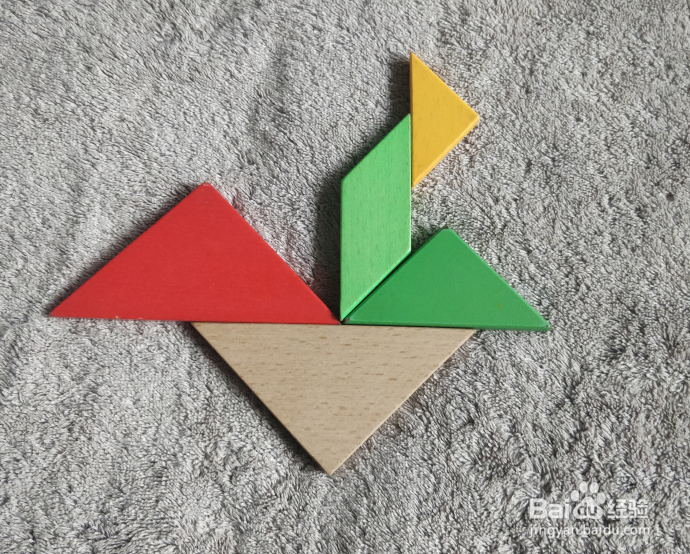 用七巧板怎样拼一个扮乌龟翻倒的幼儿呢?