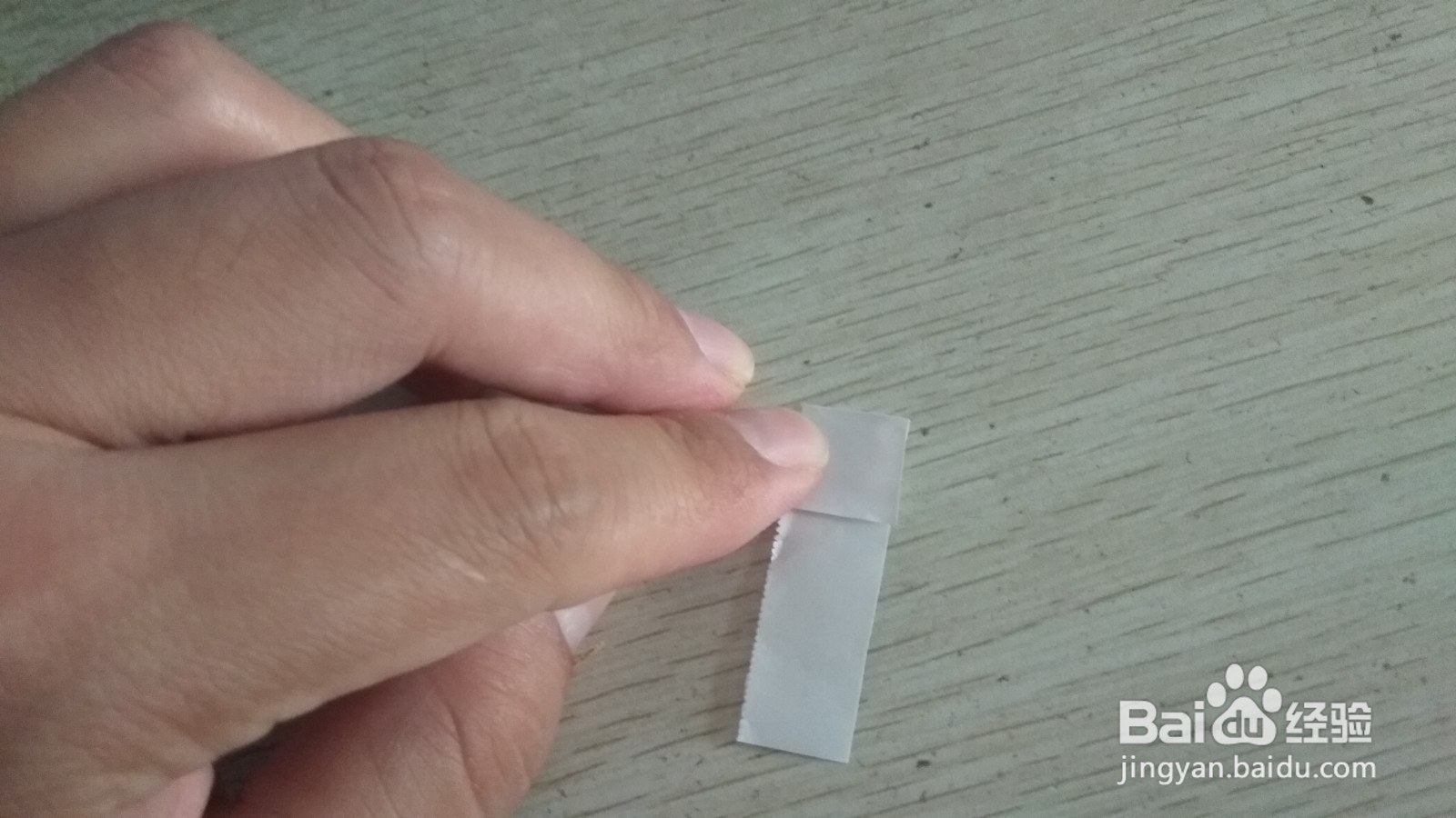 如何用一块长方形纸条做简易的钢笔的支架