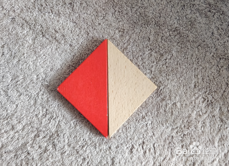 坐着的小猫用七巧板怎么拼