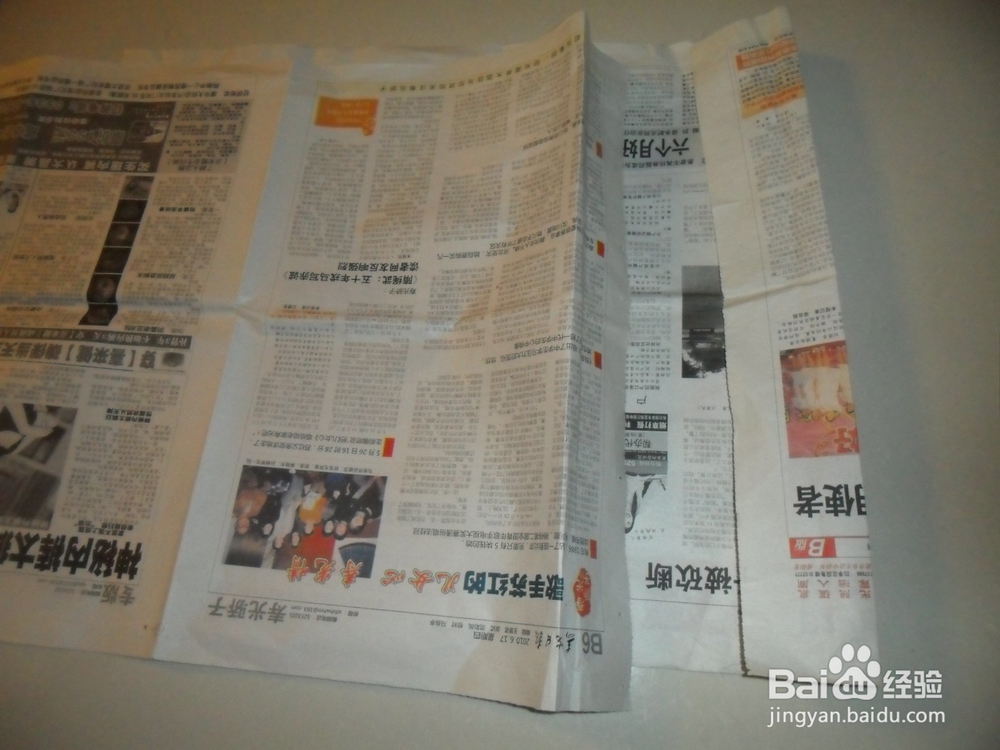 旧报纸怎么做时装