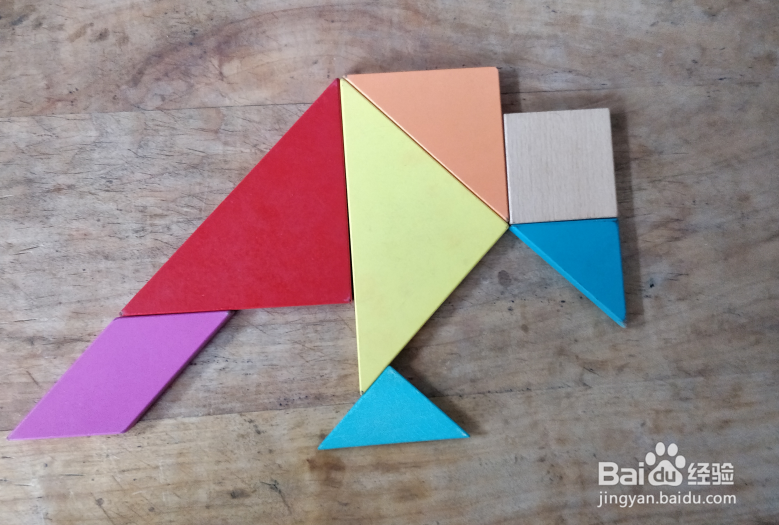 用七巧板怎样拼一只低着头的鸟儿？