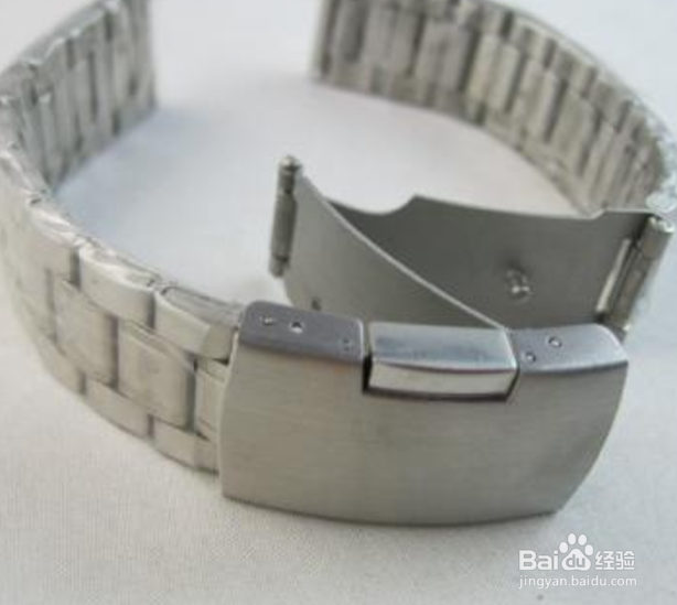 米兰钢带手表怎么调表带