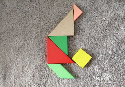 用七巧板怎样拼表演倒立的小孩儿?