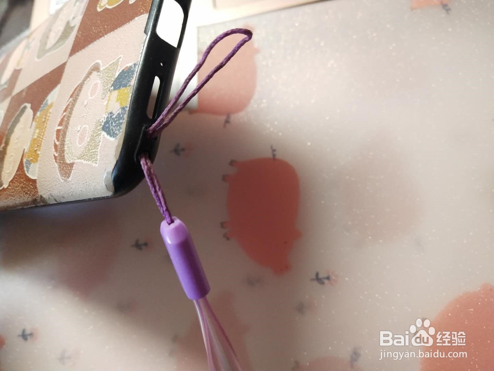 买手机壳送的挂绳怎么用