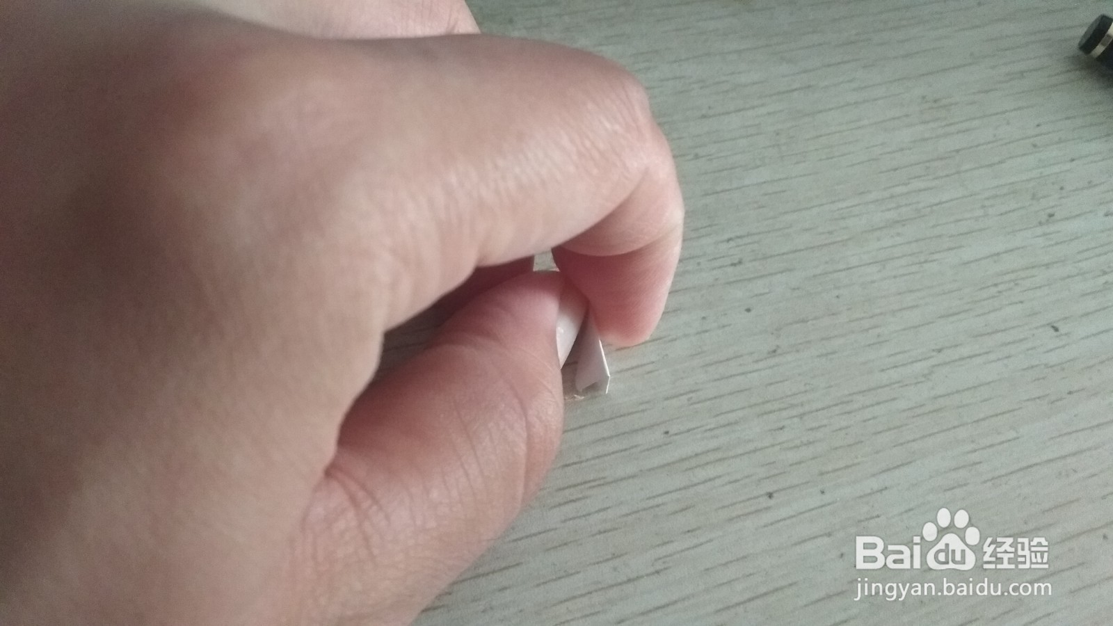 如何用一块长方形纸条做简易的钢笔的支架