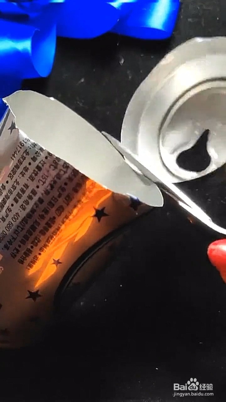 利用易拉罐磨剪刀