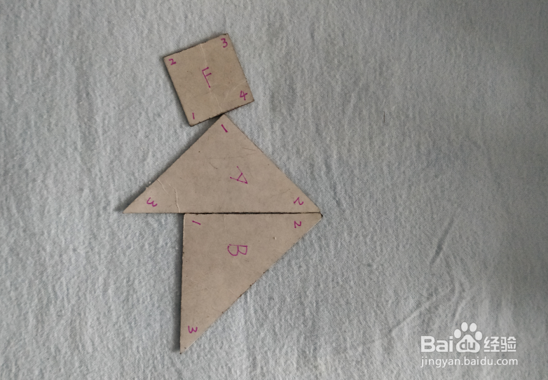 用七巧板怎样拼街上的路人?