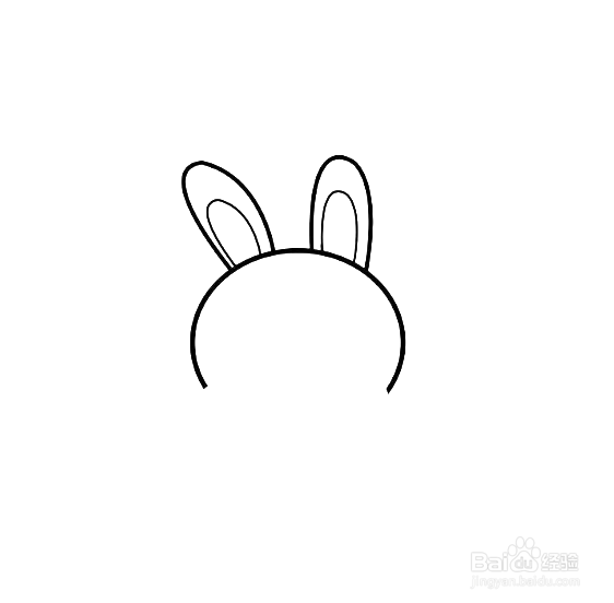 如何手工画背萝卜的兔子简笔画？