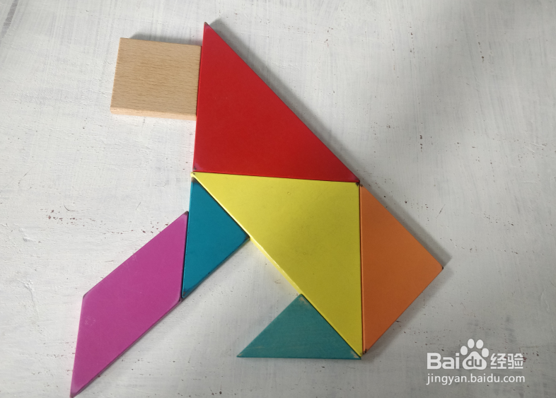 用七巧板怎样拼一只坐着看前方的猴子?