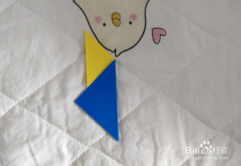 用七巧板智力拼图怎么拼一个跑着的娃娃