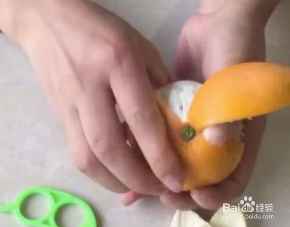 两孔剥橙器怎么用
