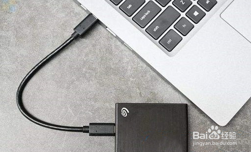 Win11移动硬盘不显示怎么办