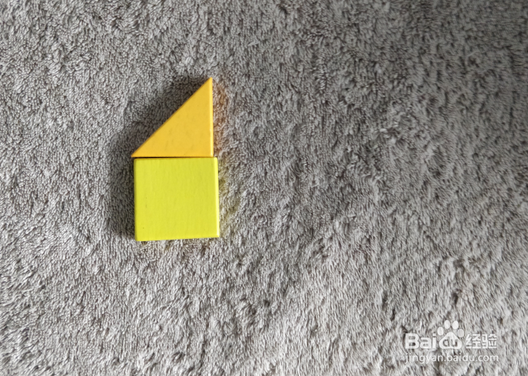 用七巧板怎样拼一只伸懒腰的猫？