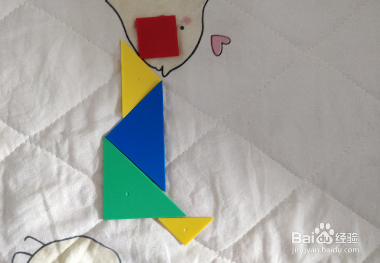 用七巧板智力拼图怎么拼一个跑着的娃娃