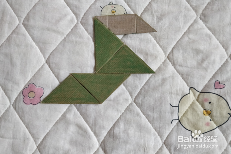 用九巧板怎么拼一个终点冲刺的小哥哥呢？