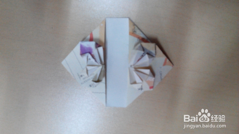 利用纸币或者折纸折一颗心的折法