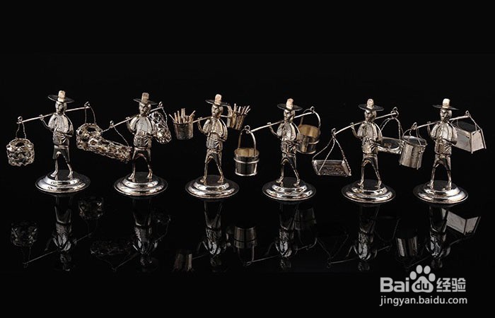 银器中的挑担子人物摆件如何欣赏