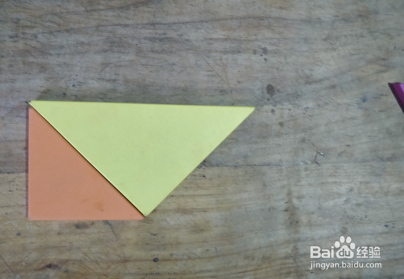 用七巧板怎样拼一座建在小岛上的房子？