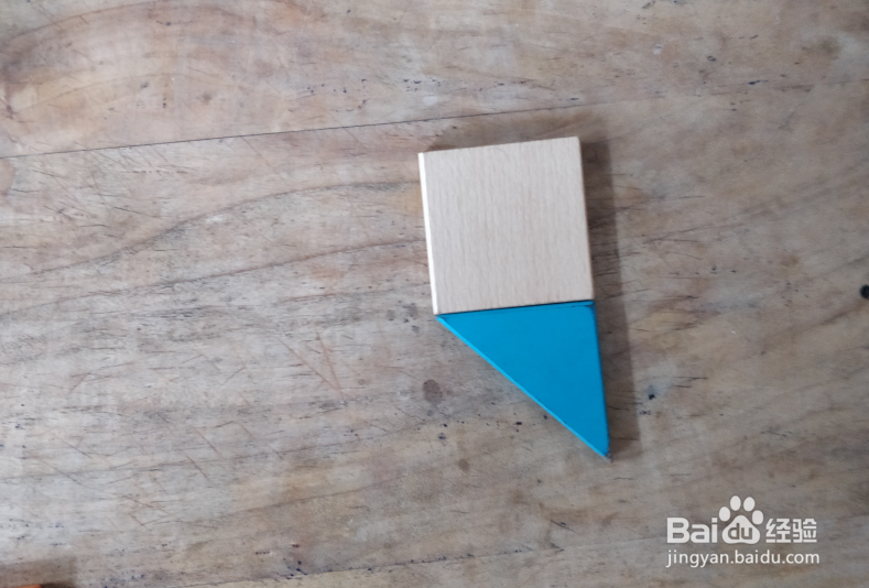 用七巧板怎样拼一只低着头的鸟儿？