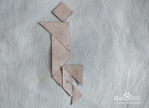 用七巧板怎样拼一个跳跃的人?