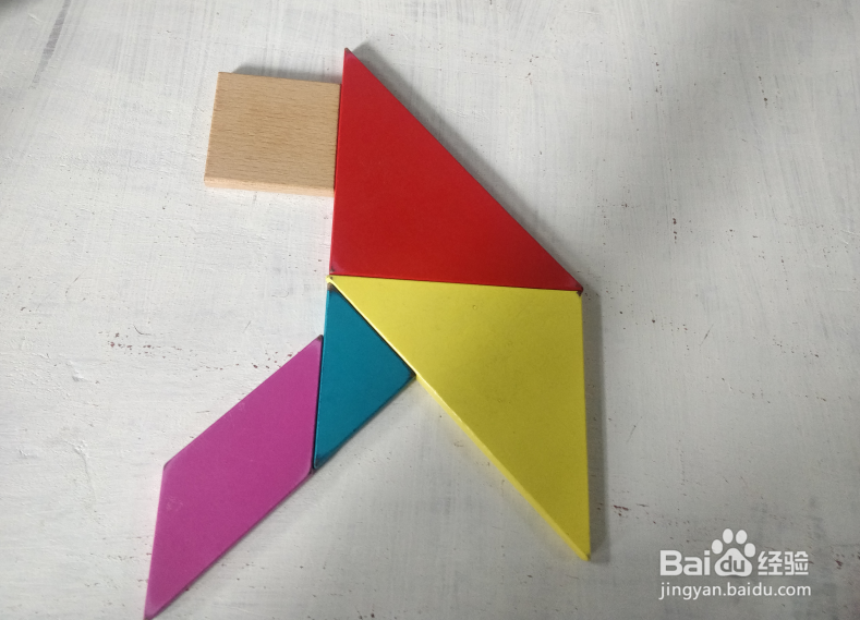 用七巧板怎样拼一只坐着看前方的猴子?