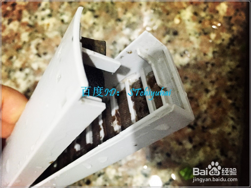 波轮洗衣机过滤盒如何清洁