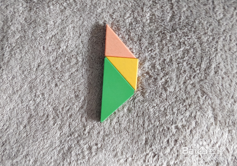 用七巧板怎样拼一个拄拐杖登山的人