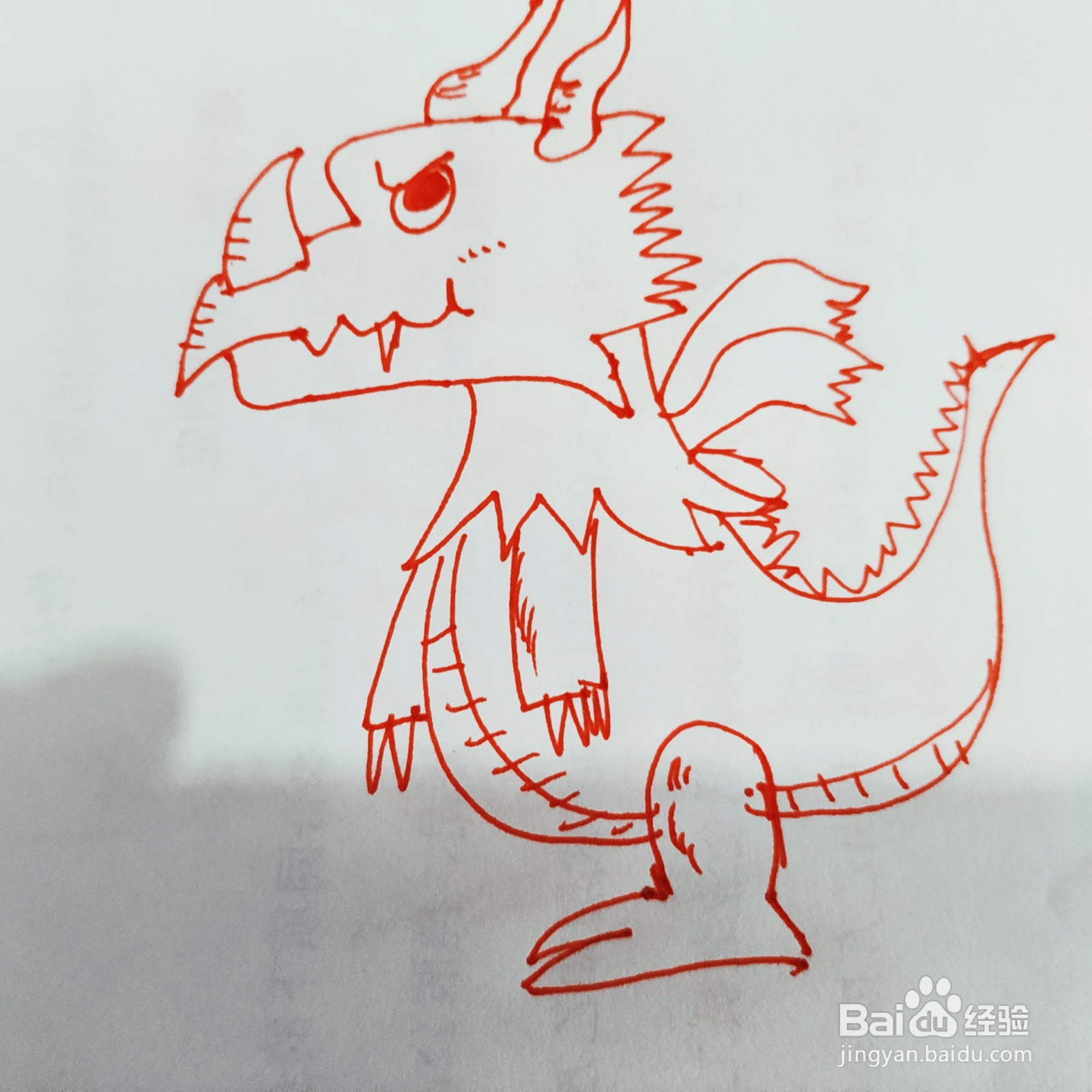 如何来画一只凶猛的大恐龙简笔画呢