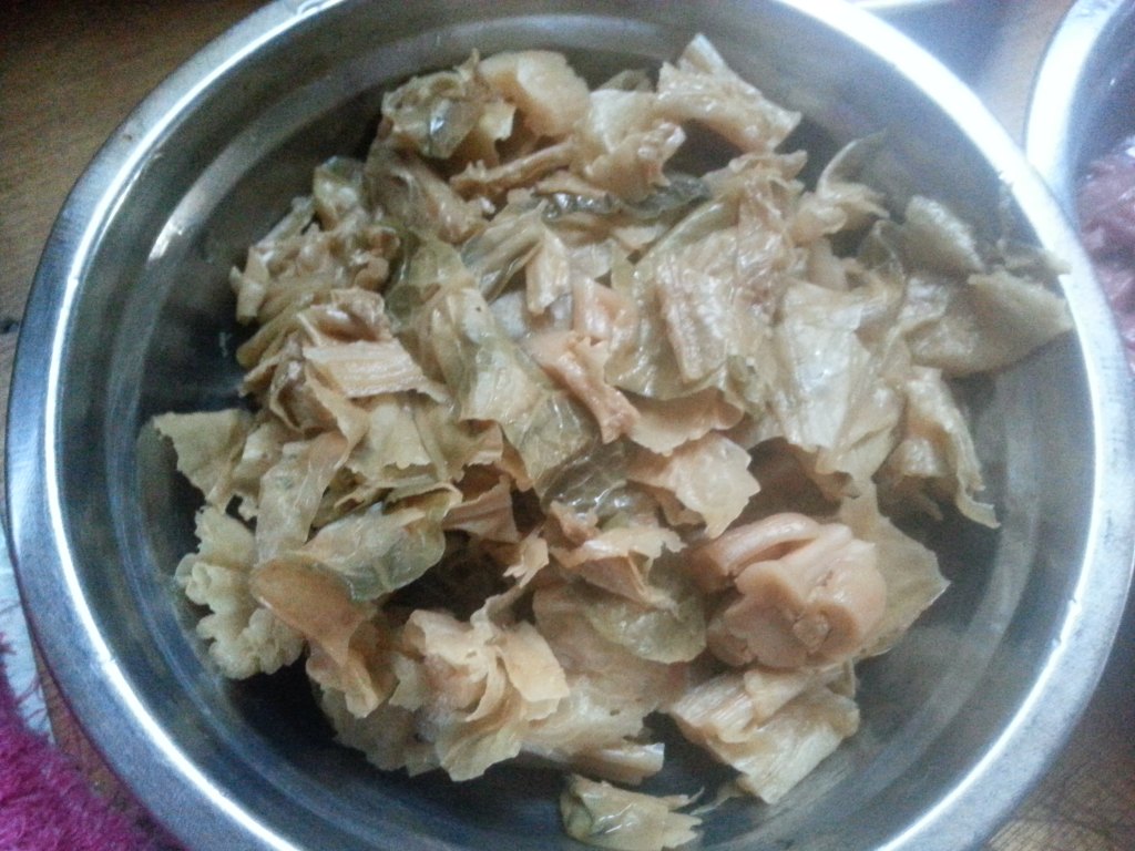 妈妈做的咸菜干炒猪心好吃极了！