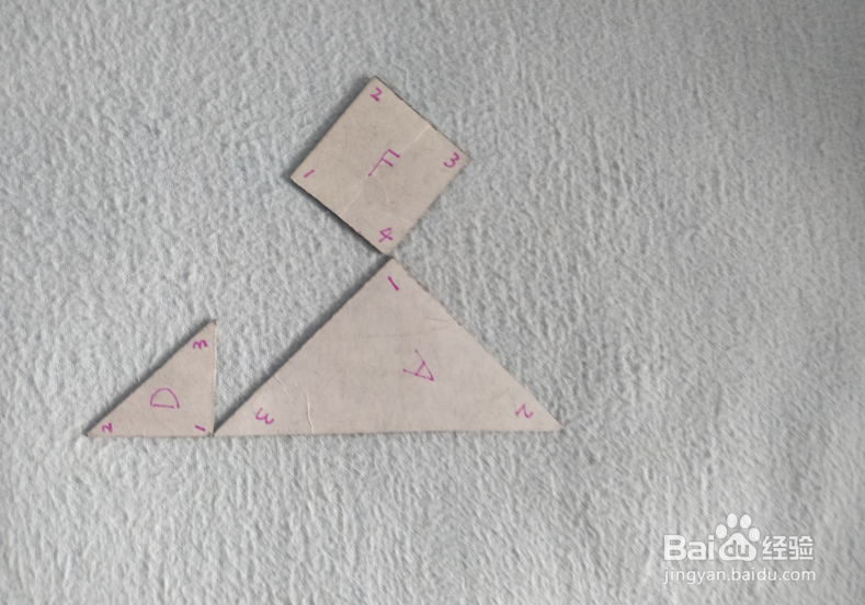 用七巧板怎样拼一个引火准备做饭的人？