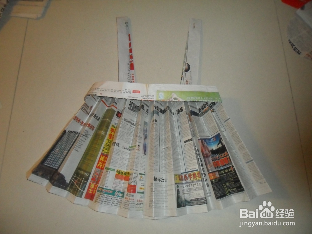 旧报纸怎么做时装