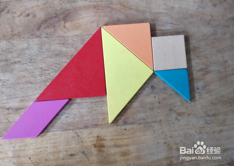 用七巧板怎样拼一只低着头的鸟儿？