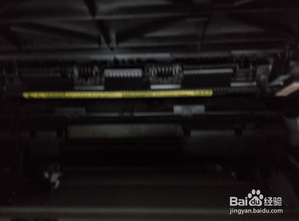 打印机卡纸了怎么办？