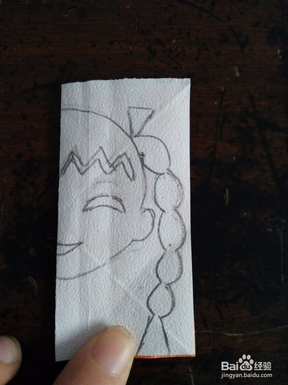 如何用纸剪简单的小萝莉头像