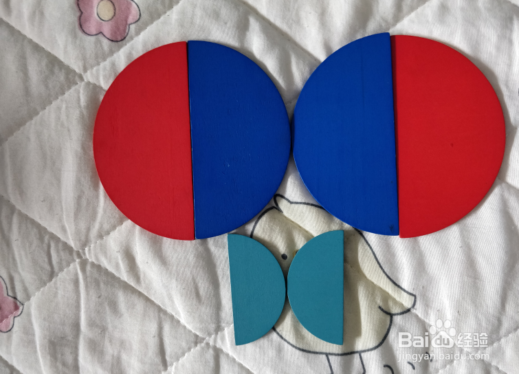 用形状积木怎么拼一只彩蝶？