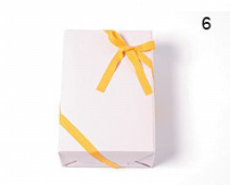 怎样包装礼物之4、基本的双斜线形丝带系法