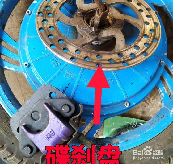电动自行车后刹放开轮子还是很卡是什么原因