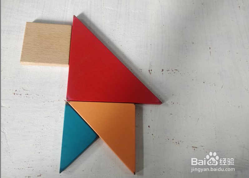 用七巧板怎样拼一只四脚挨地站着的猴子?