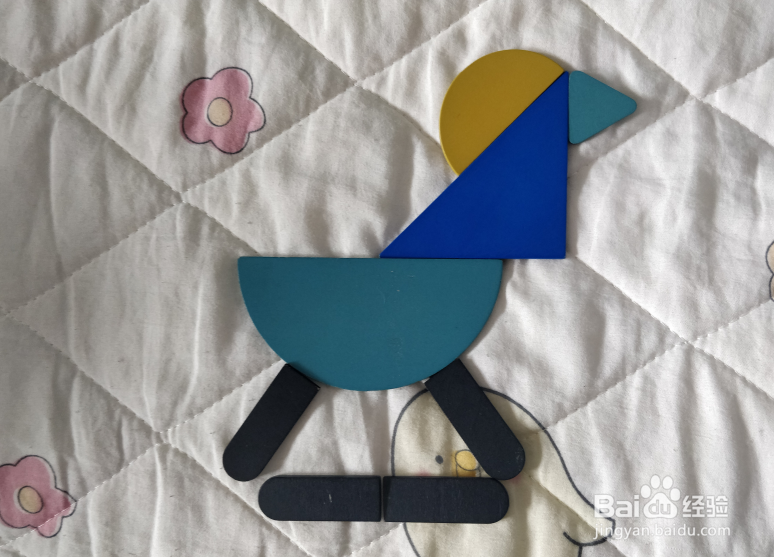 用形状积木怎么拼一只木马？