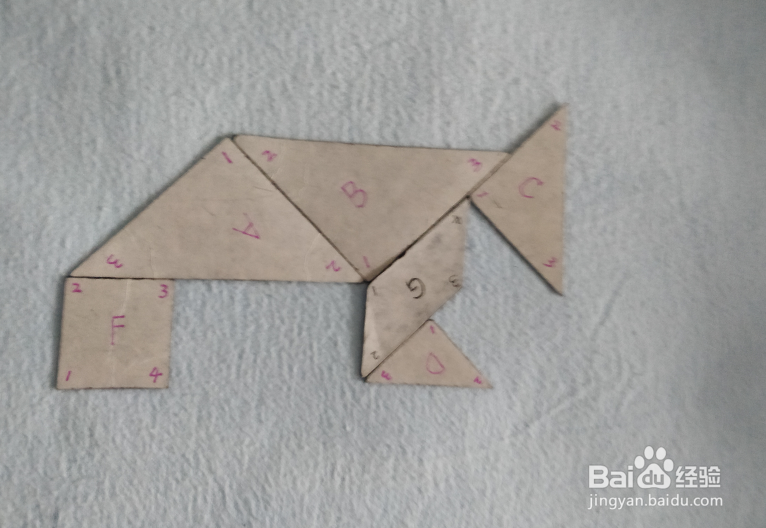 用七巧板怎样拼一头站着的犀牛？