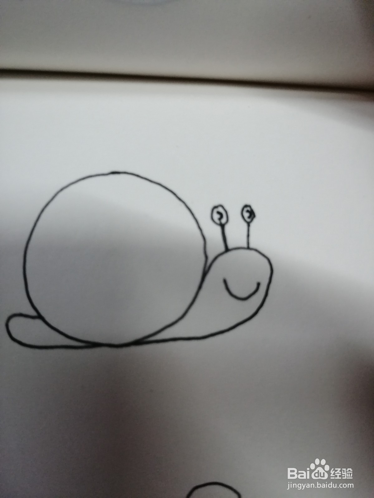 如何用圆形画出可爱的简笔画蜗牛？