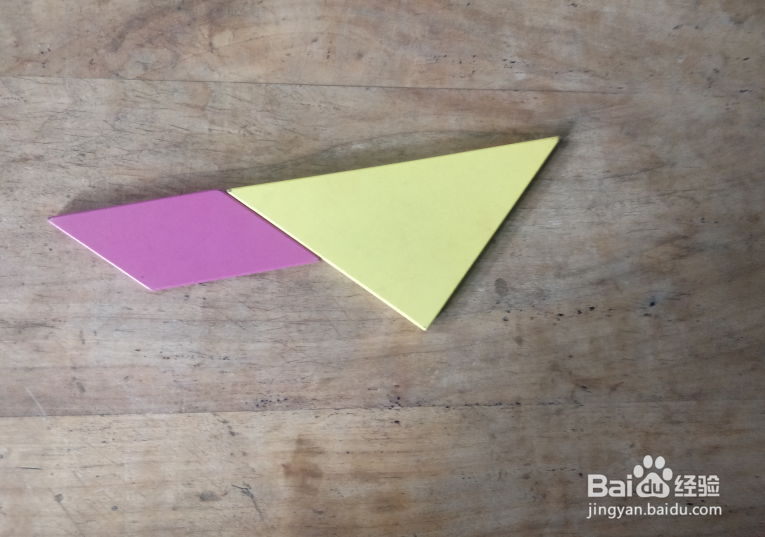 用七巧板怎样拼一个抬着胳膊向前跑的小孩？