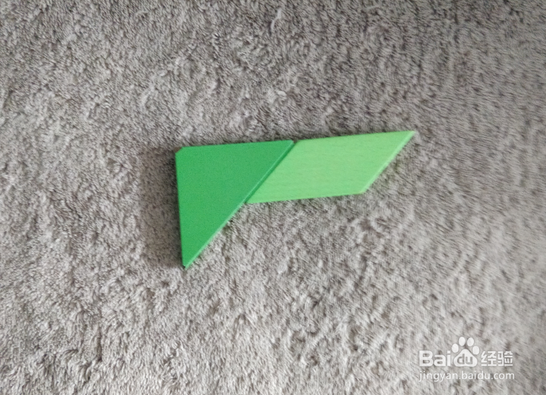 用七巧板怎样拼一个打车的女士?