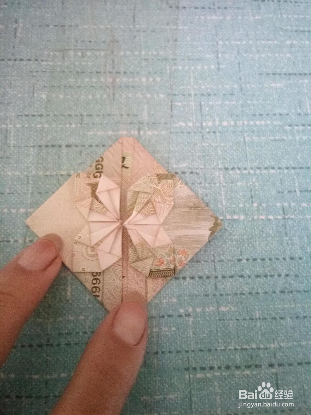 怎样用纸币折爱心