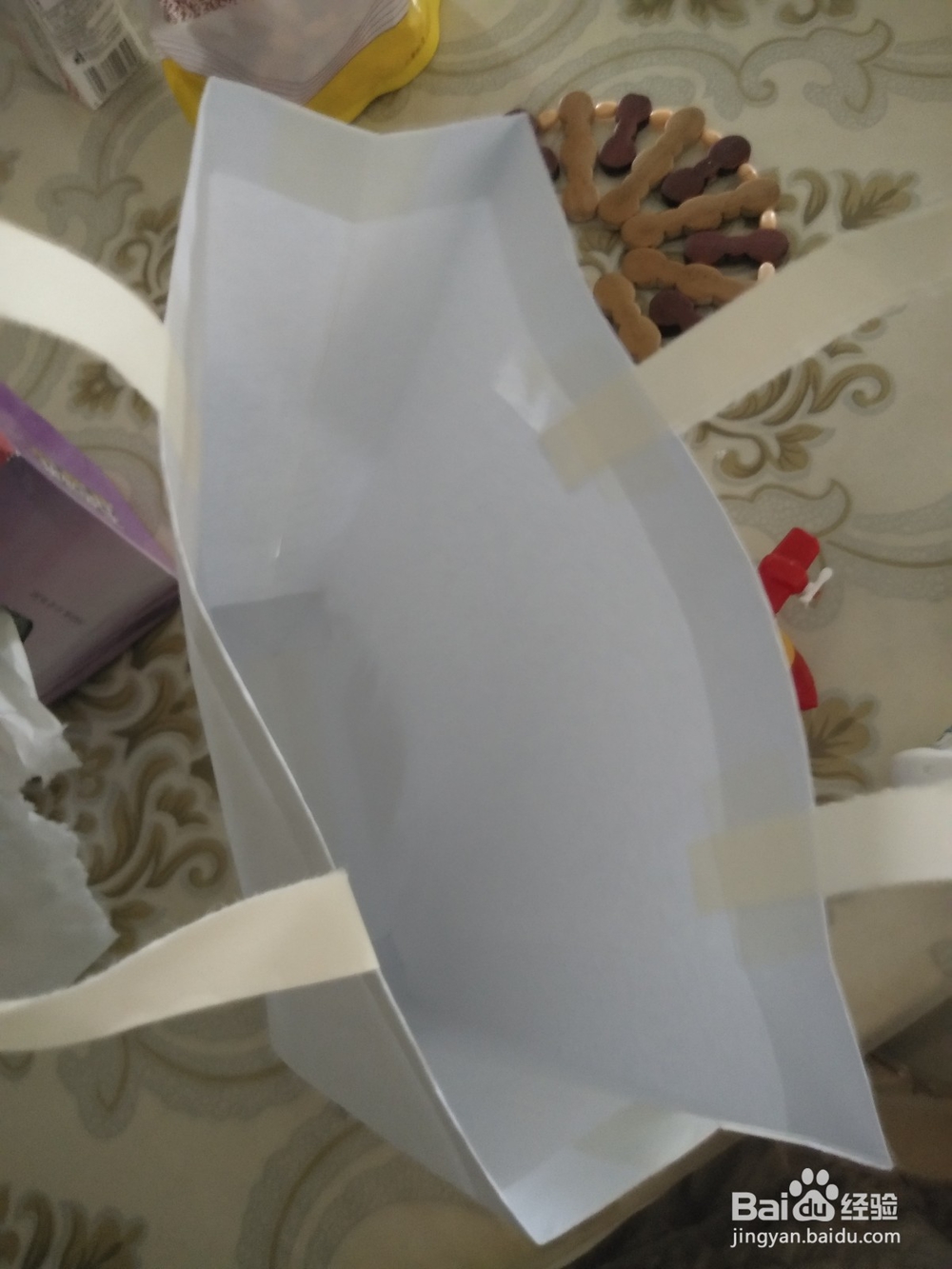 幼儿园手工怎么用A4纸做环保购物袋