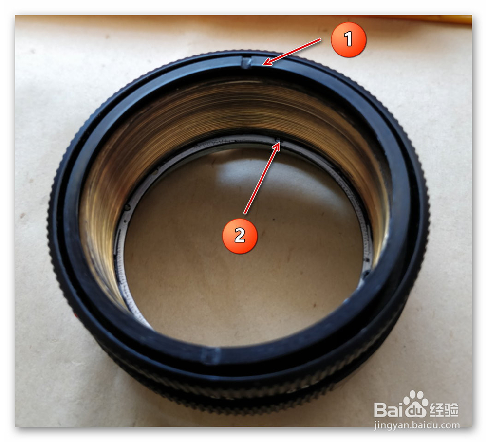 维修R28 调焦环松及对焦紧的问题