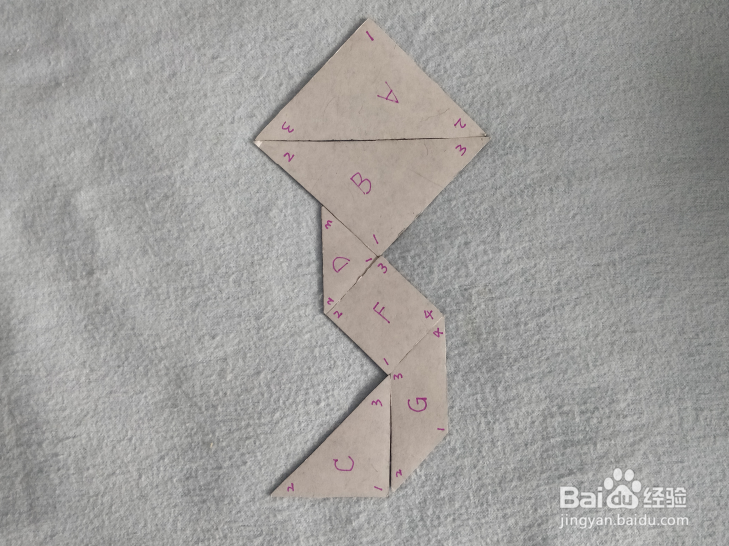 用七巧板怎样拼一只天上的风筝？