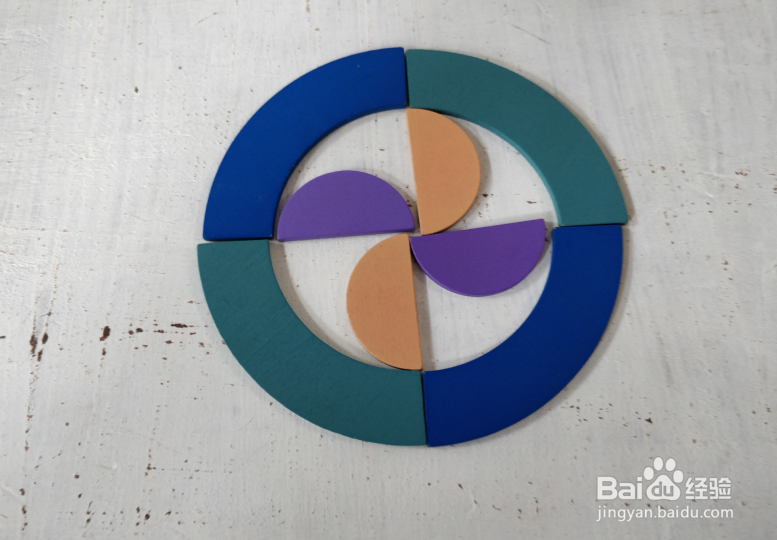 用智力拼板怎样拼一个排风扇?