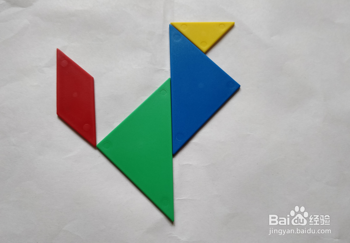 用(蝶式)七巧板怎么拼一只高兴跳跃的狗?